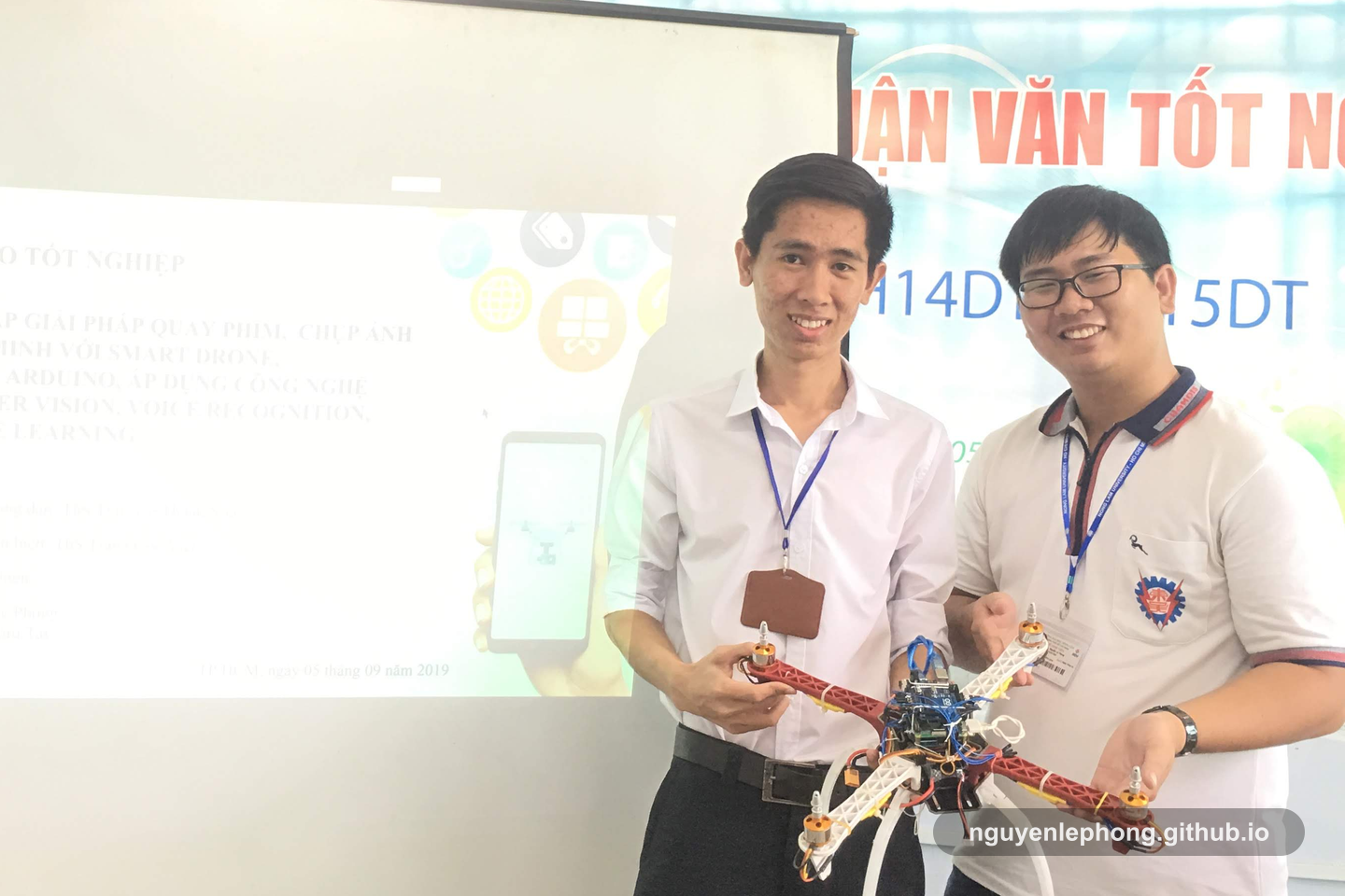 Nguyen Le Phong and a teammate present a drone prototype during a graduation defense presentation in Ho Chi Minh City.