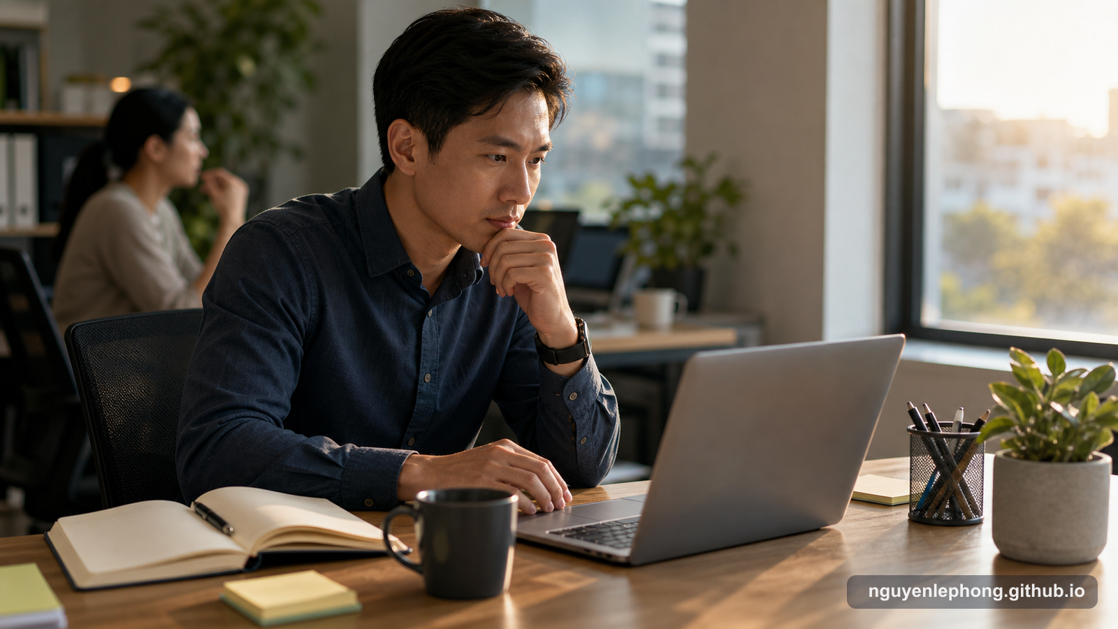 A thoughtful professional pauses at a laptop with an open notebook while a colleague sits blurred nearby, leaving space before making a conclusion.