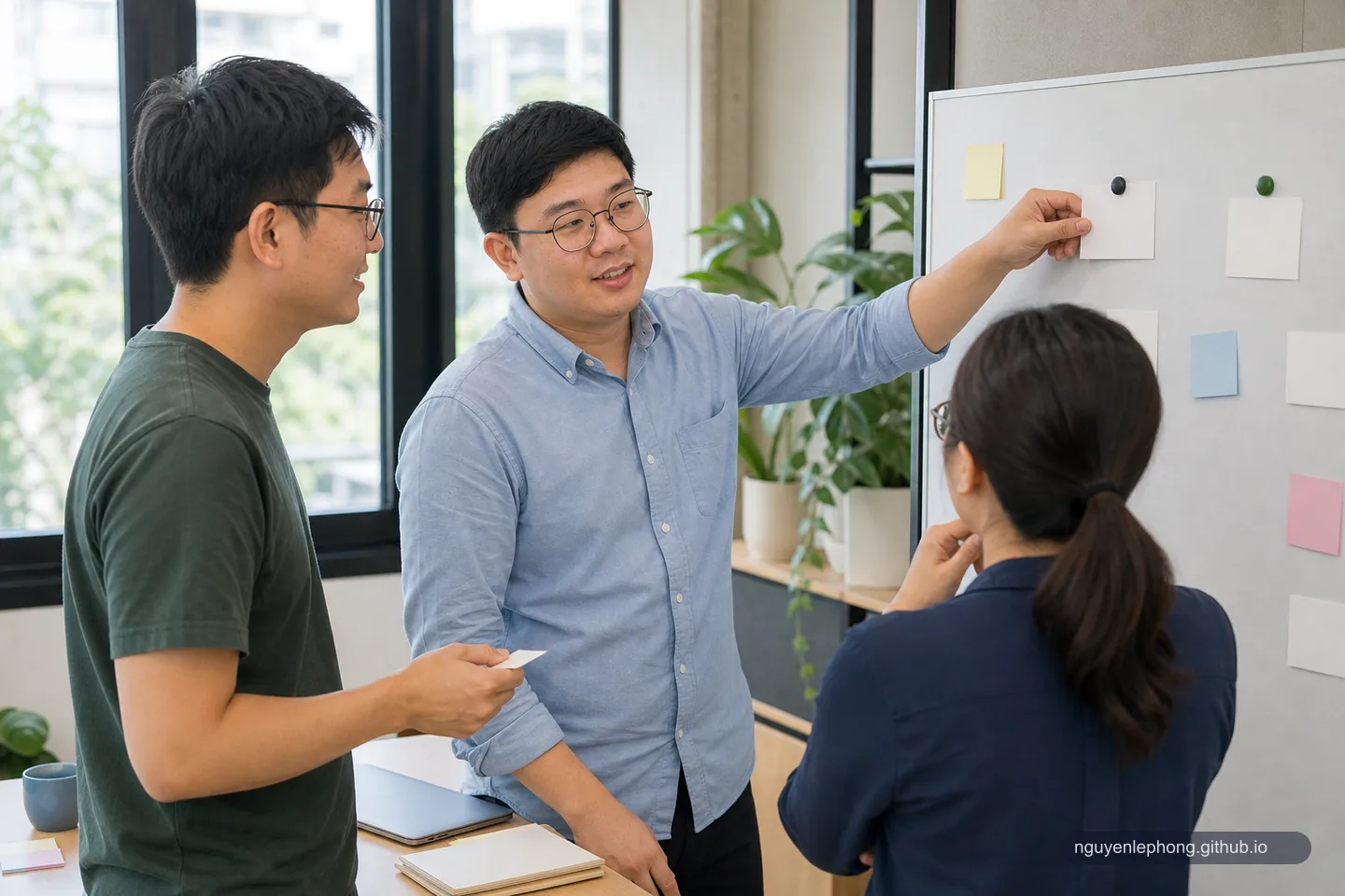 A small software team keeps a short practical standup around a simple blank board.