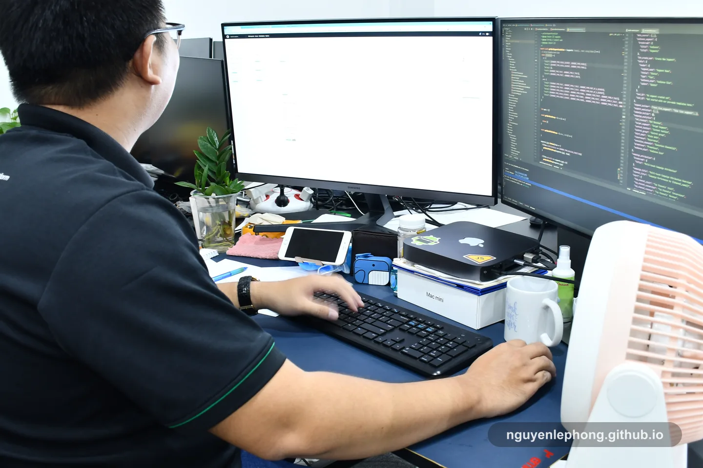 Nguyen Le Phong works at a dual-monitor desk where a shared standard makes late questions easier to settle without personal bargaining.
